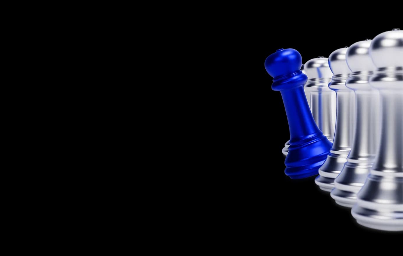A blue chess pawn standing out from a line of silver pieces